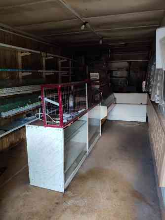 Продам отличный дом с бизнесом (магазин) в центре п. Старобешево Старобешево