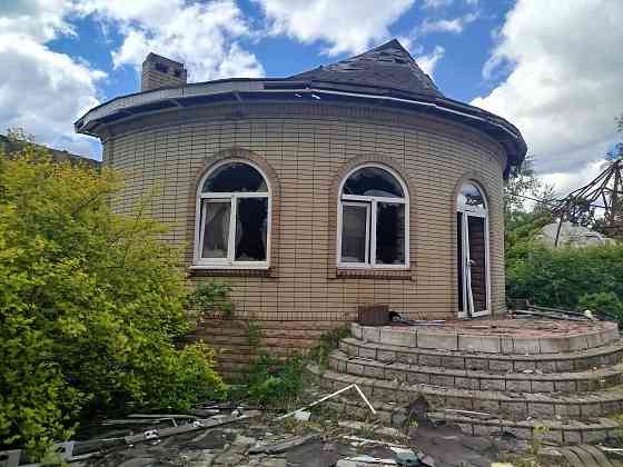 Трёхъярусный дом, на левом берегу Мариуполь
