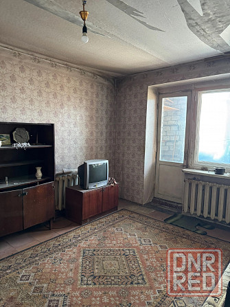 Продам 1-а комнатную квартиру в Червоногвардейском районе, ор-р 97зик Макеевка - изображение 1