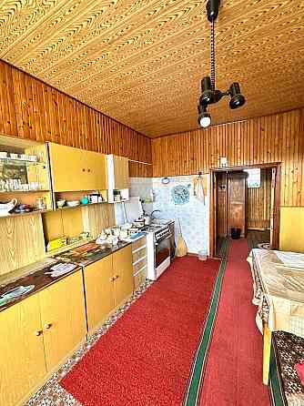 Продается отличный 5-ком. дом с пристройкой и земельный участок в г. Докучаевск, ул. Куйбышева Докучаевск