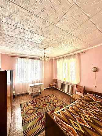 Продается отличный 5-ком. дом с пристройкой и земельный участок в г. Докучаевск, ул. Куйбышева Докучаевск