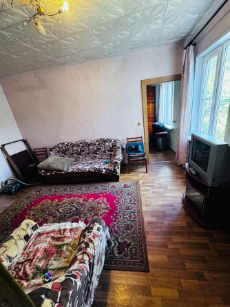 Продам квартиру на земле ( 1/4 финского дома с участком ) Макеевка,Советский Пос ш-ты 21 бис Макеевка