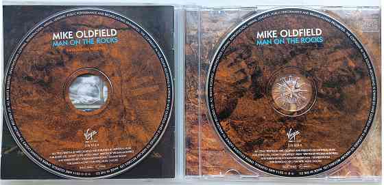 Компакт диск (аудио CD): Mike Oldfield (2004) Man on the Rocks Макеевка