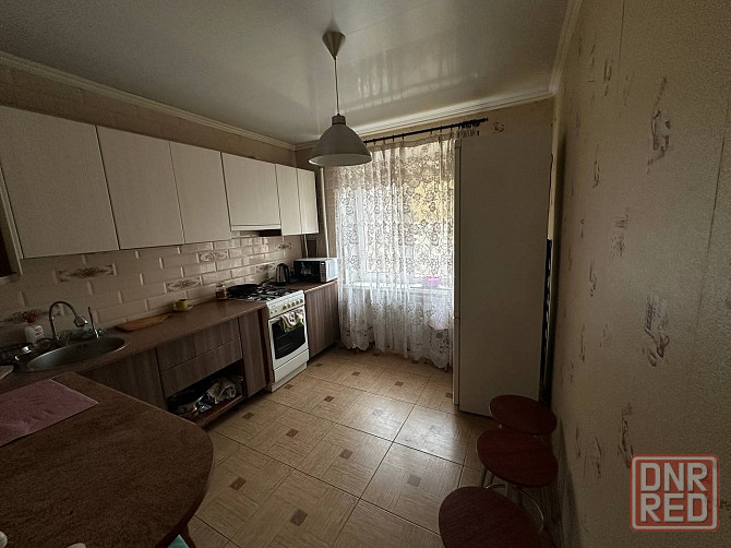 Продажа 1к.кв. (гостинка) в Ленинском районе Донецк - изображение 9