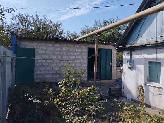 Продам земельный участок с домом на п.Лесной Макеевка