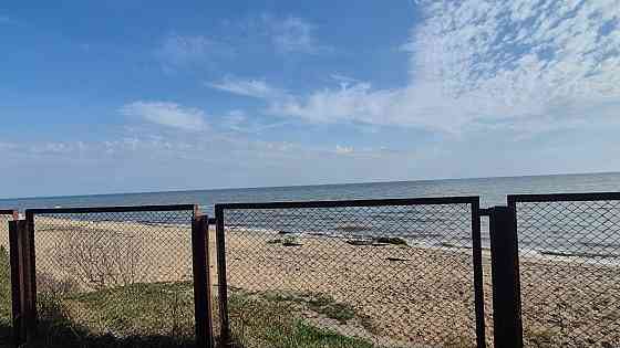 продам дом в селе безыменное на первой линии от моря. свет, газ по границе, своя скважина. дом нужд Мариуполь