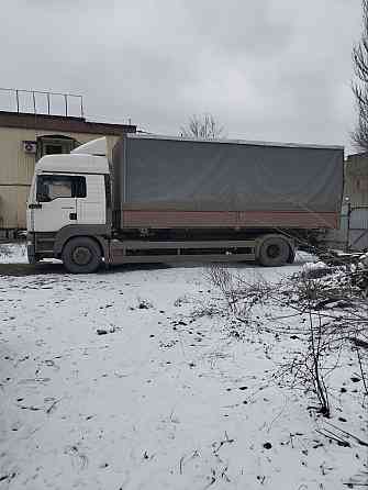 Тентованный грузовик MAN TGA 18 390, 2004г. 10т. Донецк
