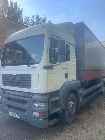 Тентованный грузовик MAN TGA 18 390, 2004г. 10т. Донецк