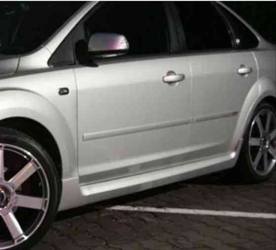 Накладки на пороги ST для автомобиля Ford Focus 2 (Форд Фокус) 2004-2011 годов выпуска Донецк