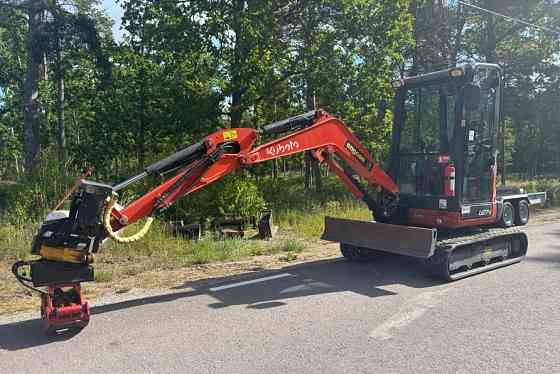 Экскаватор Kubota U27-4 с прицепом для машины Горловка