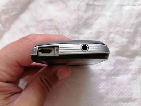 Мобильный телефон Samsung mini GT - S5570. Стаханов