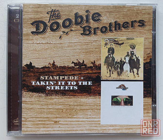 Фирменные CD: Doobie Brothers (1975 и 1976) Stampede/ Takin' It To The Streets Макеевка - изображение 1