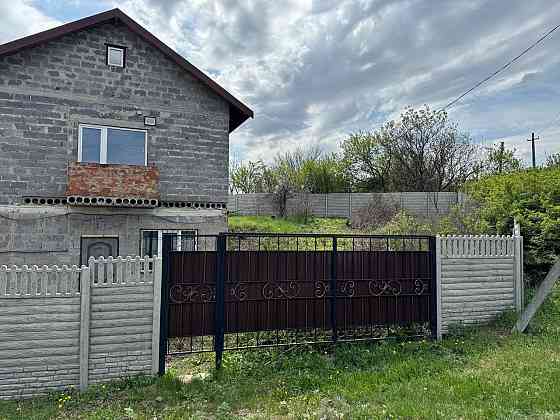 Продам дом с земельным участком в Ленинском р-не г. Донецка Донецк