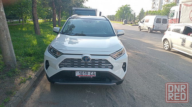 Продаю Тойота RAV4 Гибрит год 2021 лиметет комплектация цвет кузова белый жемчуг Донецк - изображение 1