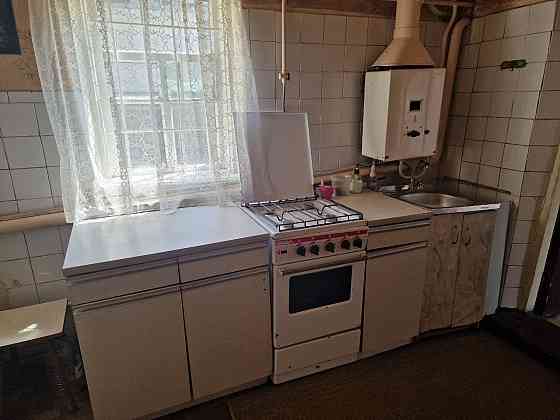 Продам дом с земельным участком в Калининском районе. Торговый институт. Между б.Шевченко и пр.Мира Донецк