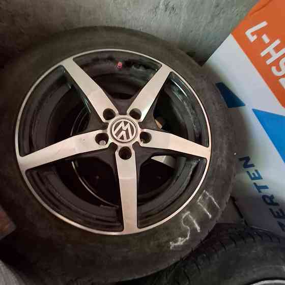 Продам 4 диска с резиной r 15 VW Макеевка