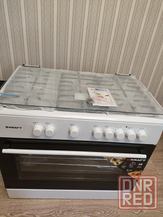 Продам новую газовую плиту с электродуховкой KRAFT kf-fsk9407aewi Донецк - изображение 1