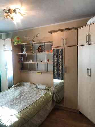 Продам дом Текстильщик 100 м2 с капитальным ремонтом,гараж,8 сот Донецк