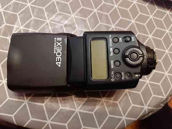 Продаю зеркальный фотоаппарат Canon EOS 450D с аксессуарами Макеевка