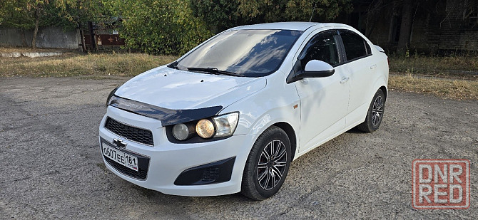 Chevrolet Aveo T300 Красный Луч - изображение 1