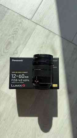 Продам обьектив lumix 12-60 фокусное 2.8-4.0 Шахты