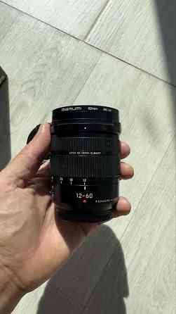 Продам обьектив lumix 12-60 фокусное 2.8-4.0 Шахты