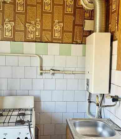 Продам 3к.кв. Калининский р-н. Ориентир Калининский рынок. ул.Овнатаняна. Донецк