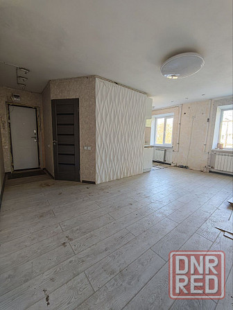 Продается трехкомнатная квартира в центре Мариуполь - изображение 1