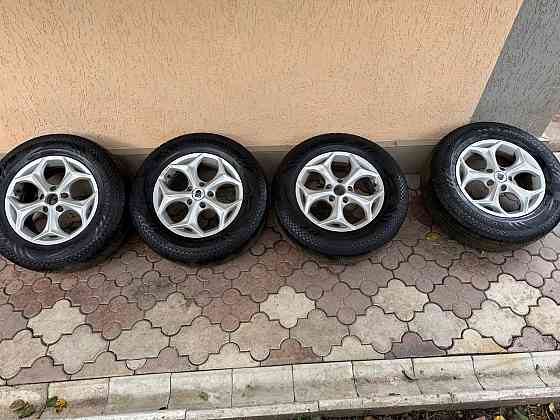 Продам резину с дисками 5/114,3 и резина 215/70/16 -23 года Донецк