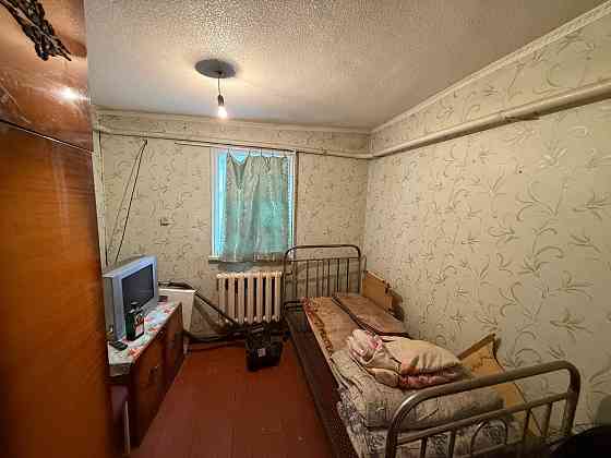 Продам дом с газом, 78 м.кв., участок 6 соток - Харцызск, ул. Крупской, Черемушки Харцызск