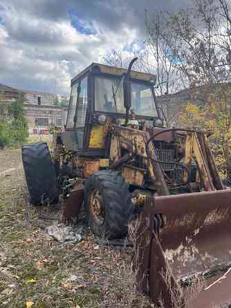 Продам экскаватор погрузчик Донецк