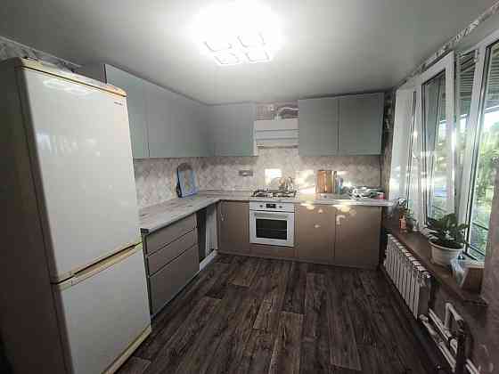 Отличный дом с ремонтом и участком! Мариуполь