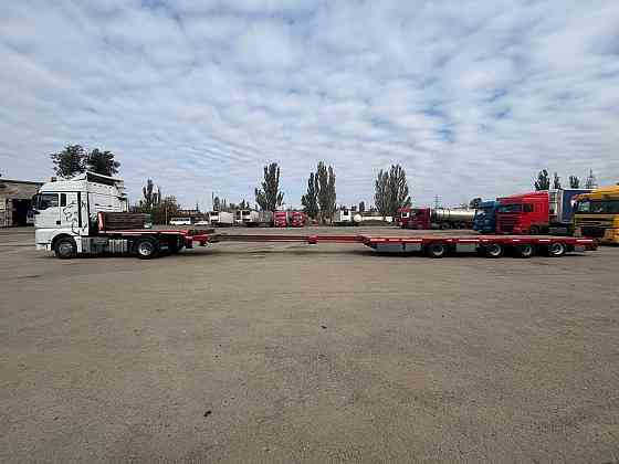 услуги низкорамного трала 50тонн,перевозка спецтехники и негабаритных грузов по днр и новым регионам Донецк