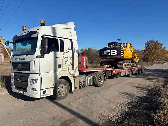 Услуги низкорамного трала 50тонн,перевозка спецтехники и негабаритных грузов по днр и новым регионам Донецк