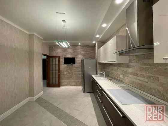 Продам новую 3 к.кв новострой 125 кв м с паркингом Розы-Люксембург Донецк