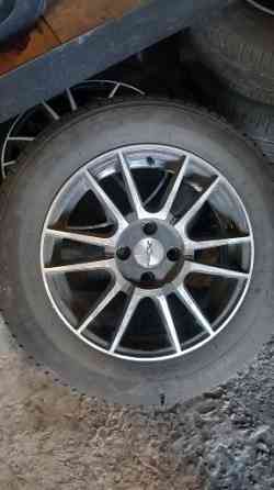 Продам 4 колеса в сборе с дисками MICHELIN 185/65 R15 летние почти новые, цена договорная Донецк