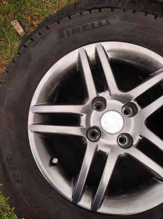 Продам литые диски с зимней резиной на автомобиль Пежо Донецк