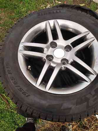 Продам литые диски с зимней резиной на автомобиль Пежо Донецк