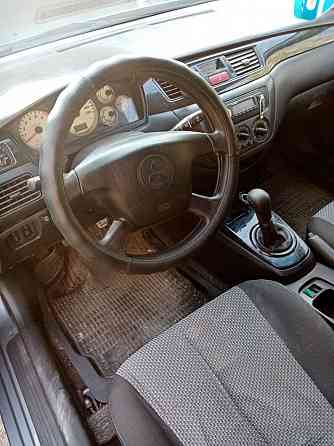 Мицубиси, Mitsubishi 9, на газу. Донецк