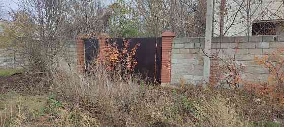 Участок с недостроенным домом Донецк