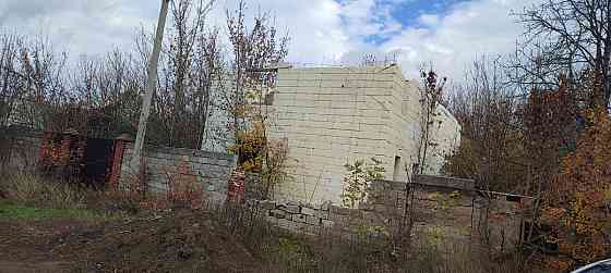 Участок с недостроенным домом Донецк