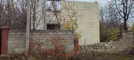 Участок с недостроенным домом Донецк