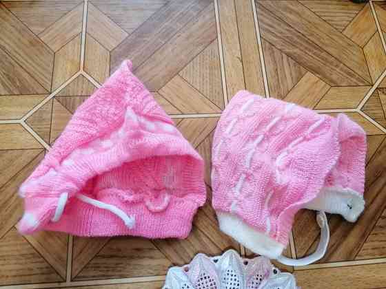 Продам шапочки шапки для новорожденной девочки Донецк