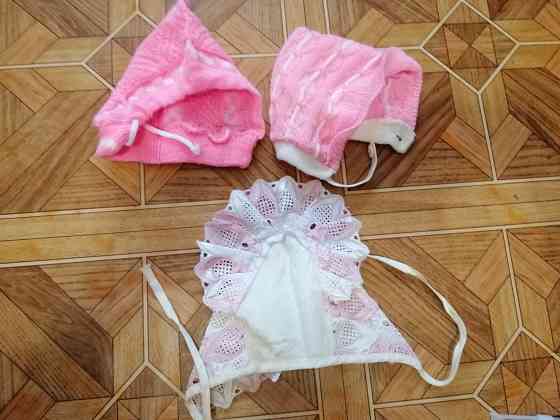 Продам шапочки шапки для новорожденной девочки Донецк