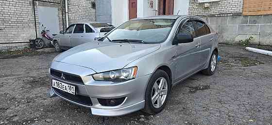 Продам Mitsubishi Lancer X Красный Луч