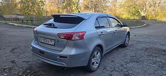 Продам Mitsubishi Lancer X Красный Луч