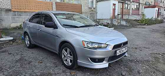 Продам Mitsubishi Lancer X Красный Луч