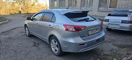 Продам Mitsubishi Lancer X Красный Луч