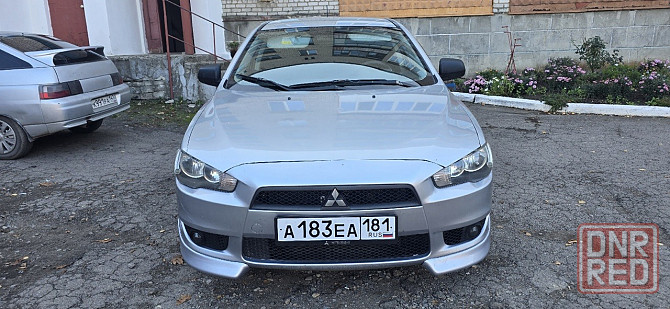 Продам Mitsubishi Lancer X Красный Луч - изображение 1