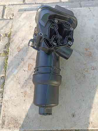 Продам Корпус масляного фильтра Skoda Octavia (A5 1Z-) 2004-2013. 06D115397J VAG (оригинал б/у Донецк